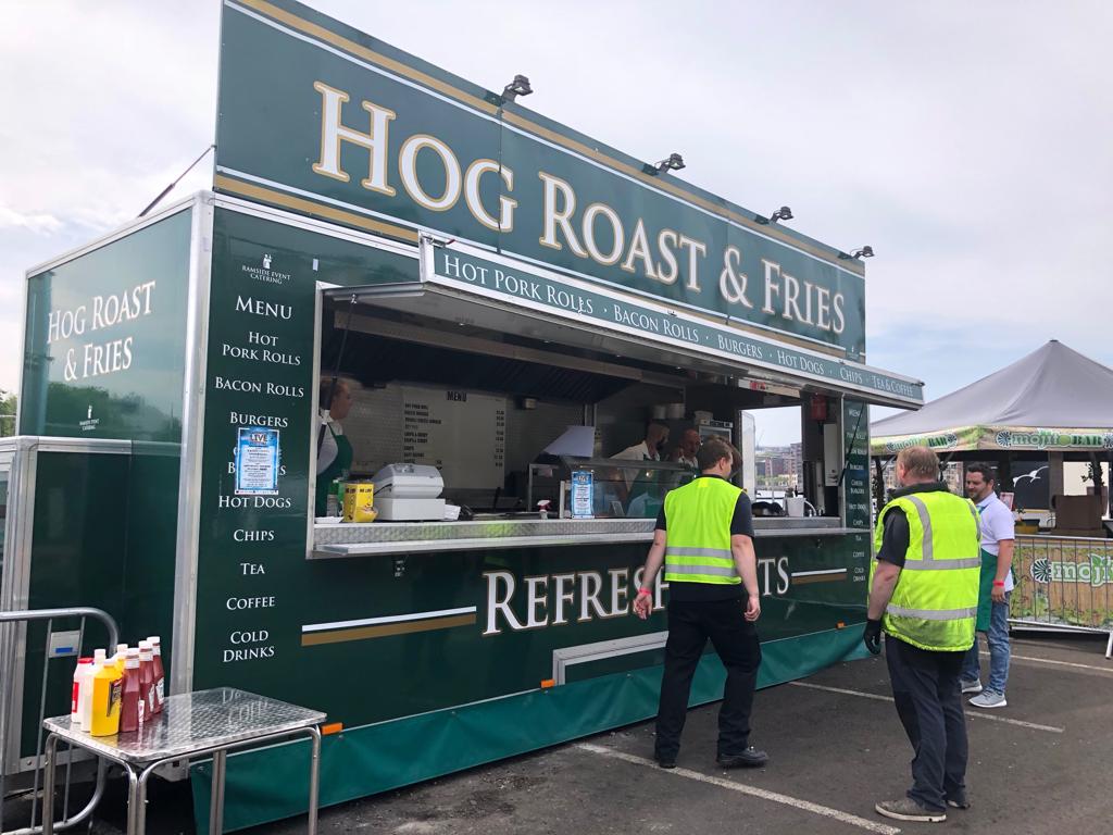 Hog Roast & Chips trailer serving at an event