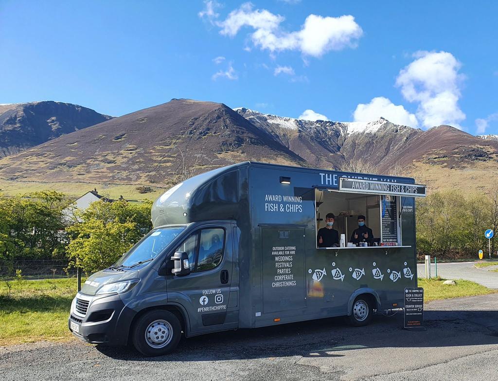 The Chippie Van parked in front of Lake District fells